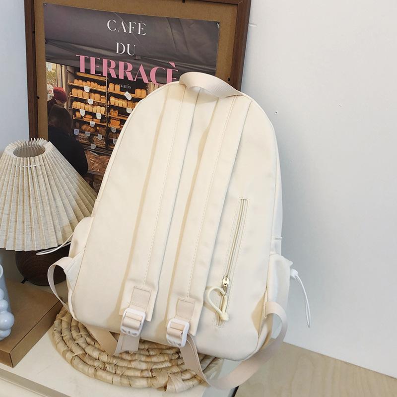 School bag Korean version ins style versatile junior high school student school bag solid color letter backpack high value simple lightweight backpack