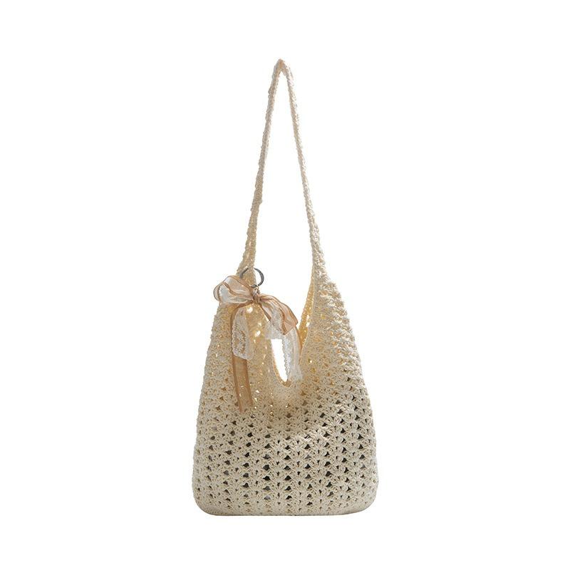 Summer hollow woven bag women's new vacation beach bag commuter shoulder tote bag knitted bag