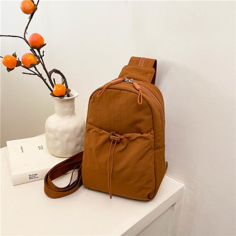 

Summer new multi-functional fashion casual small backpack women s travel outdoor backpack versatile cycling breast bag коричневий