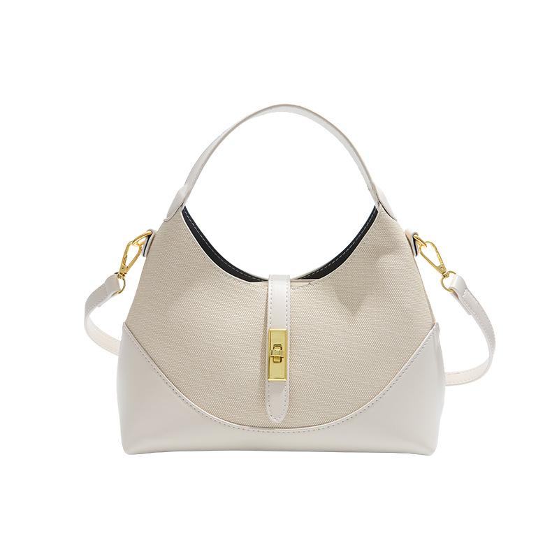 High-end contrasting colors, niche design, messenger bag, women's new dumpling bag, versatile commuter, portable underarm bag