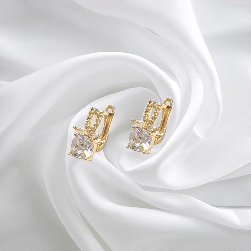 Elegant Gold-Plated Zircon Earrings for Women - Fashionable Southeast Asian Design, Perfect for a High-End Vacation Style.