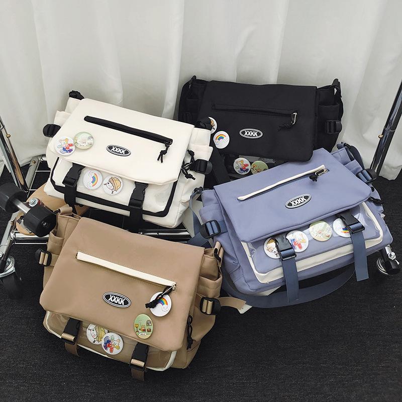 Schoolbag messenger bag women's 1011 new fashion tooling large-capacity messenger bag men's casual versatile student class shoulder bag