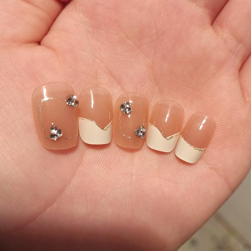 

Wearable Rhinestone Nail Art: Removable White French Tips