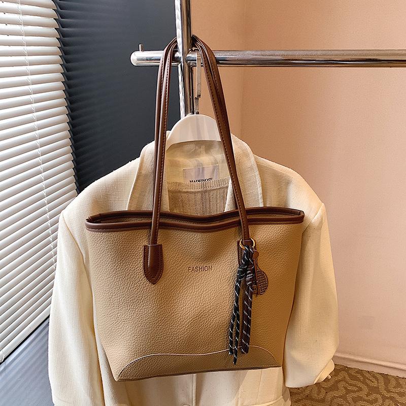Popular retro bag women's large capacity 2025 new spring casual messenger bag portable bucket bag