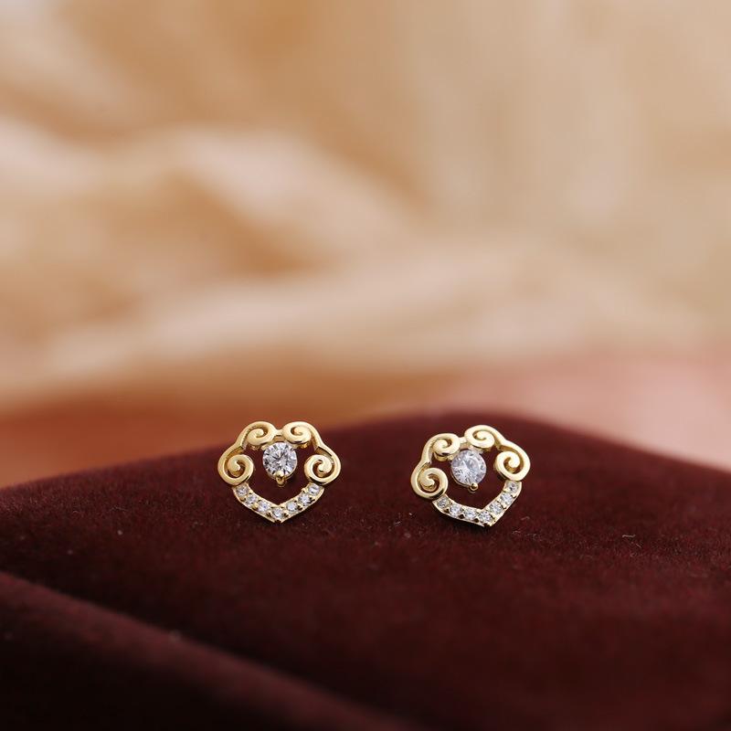 Hollow Xiangyun cyrkonowe kolczyki Ruyi damskie niszowe klasyczne kolczyki w stylu narodowym wysokiej klasy retro temperament