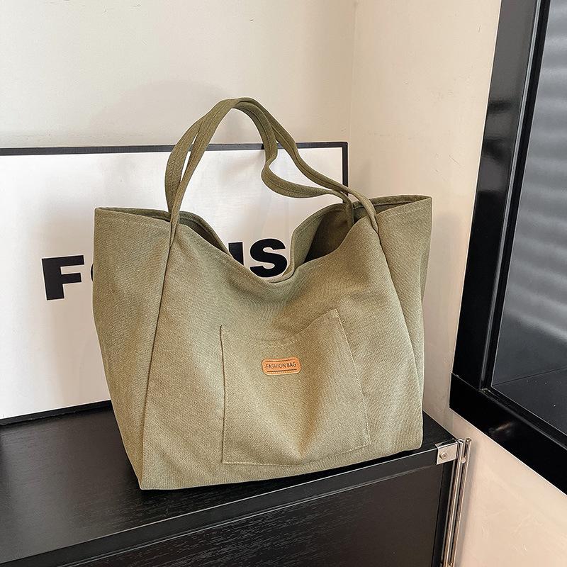 Casual large-capacity canvas bag women's bag 2025 new solid color simple tote bag fashionable shoulder armpit bag