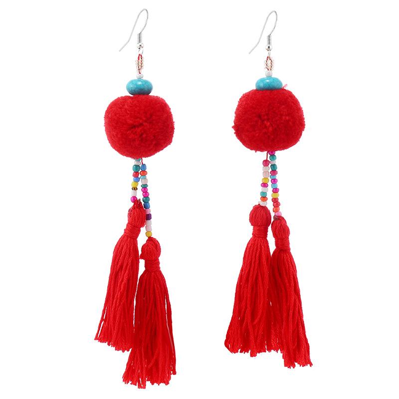 Bohemian retro pom-pom fringed earrings women's vacation long temperament niche personality earrings