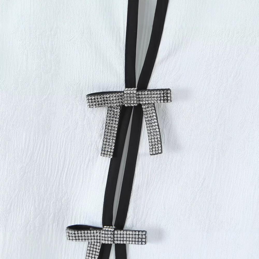 2025 Spring Women's Fashion Bow Textured Jacquard Mini Skirt: Euro-American Style