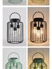 Wrought Iron Solar Garden Lantern - Decorative Outdoor Light for Courtyard and Villa.