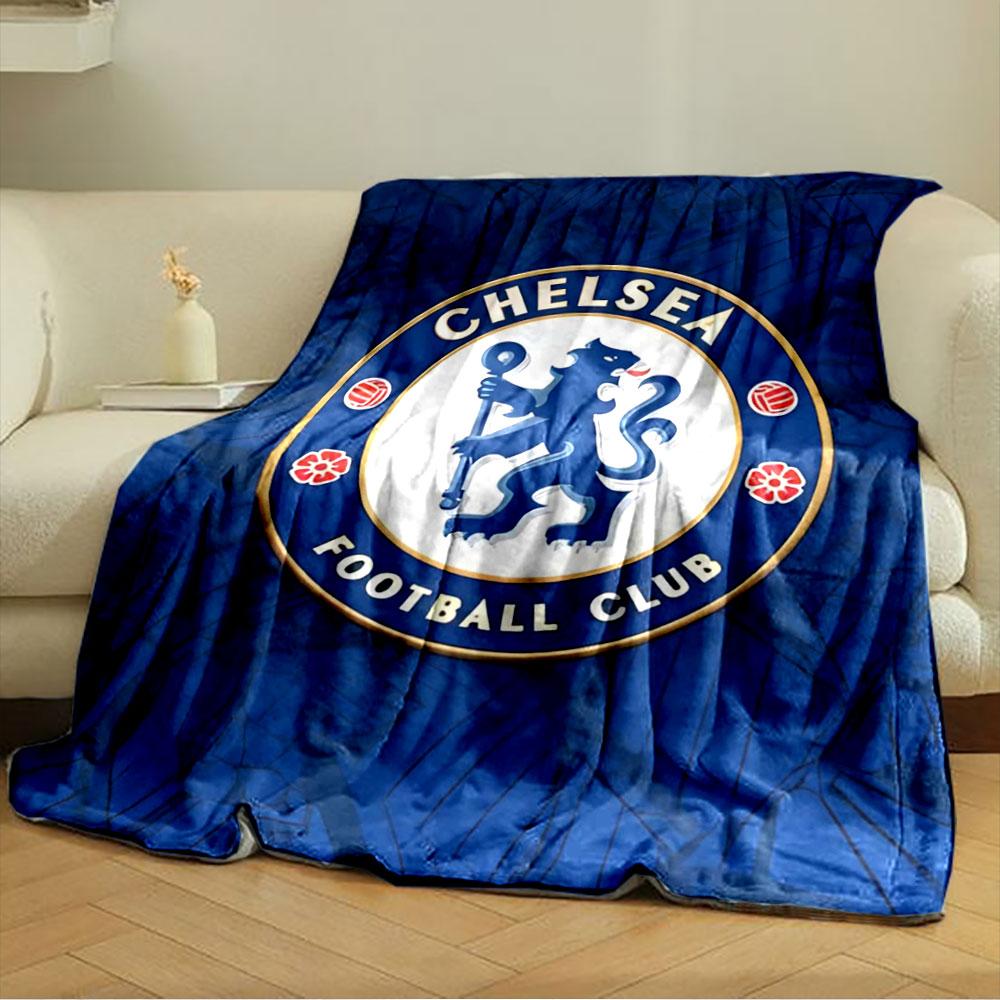 A lion holding a staff inside a circular emblem with blue and gold accents. for all seasons blanket lunch break throw gift
