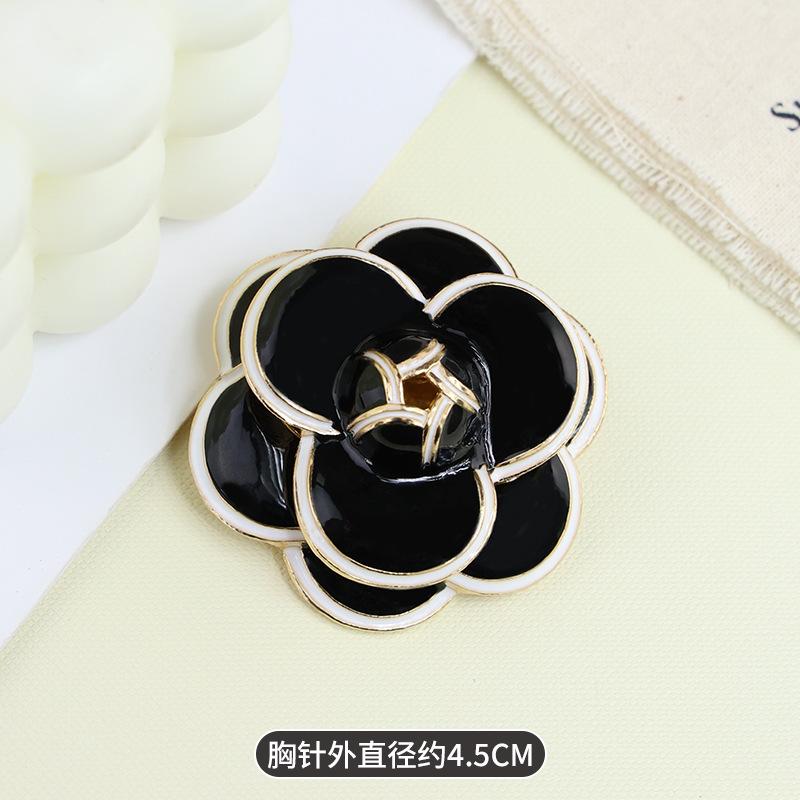 Korean simple retro Phnom Penh camellia brooch high-end women's rose corsage alloy badge clothing accessories
