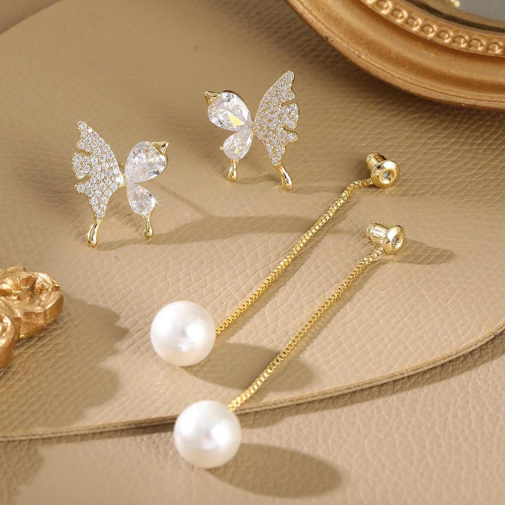 Elegant Two-Way Butterfly Pearl Tassel Earrings: Versatile, Slimming Studs for a Sweet, High-End Look.