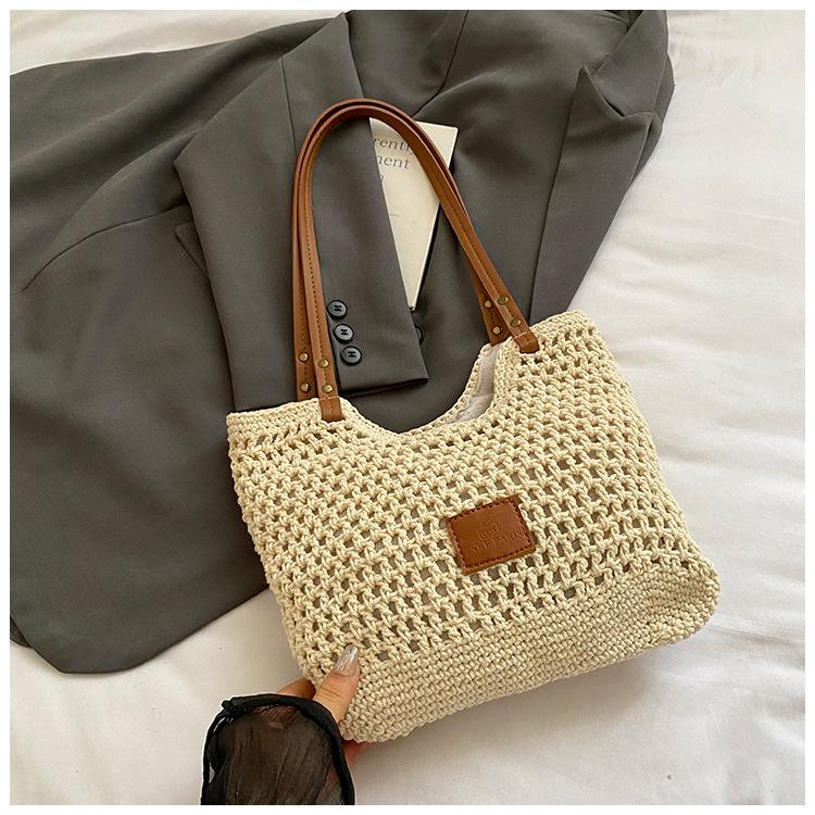 

Summer hollow woven large-capacity tote bag women s 2025 tide fashion leisure seaside vacation shoulder bag