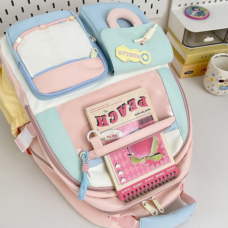 Junior high school student schoolbag college wind large capacity female contrasting color design small fresh backpack cute girl backpack pain bag