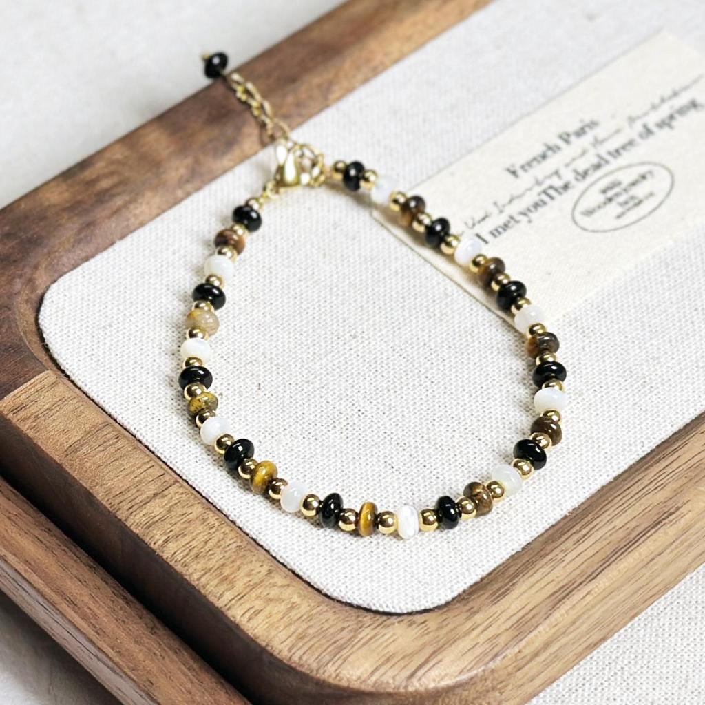 Tigeröga Snäckskal & Fröpärlor Armband - Nischad Design