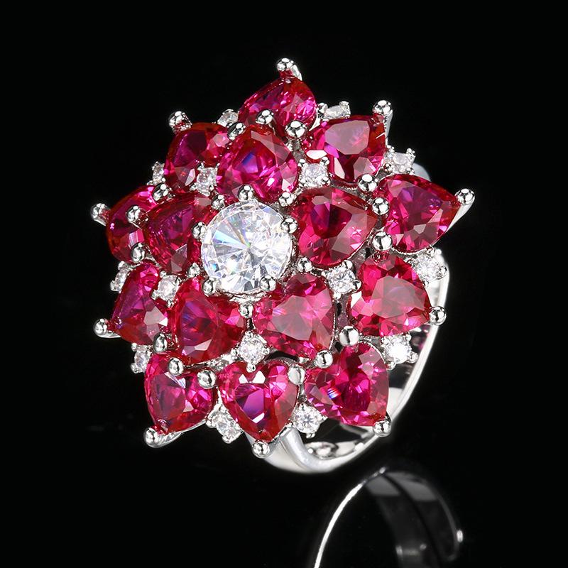 

Ювелирные изделия Медное дно Позолоченная Имитация Красного Корунда Цветок Высококачественный Легкий Роскошный Костюм Женский