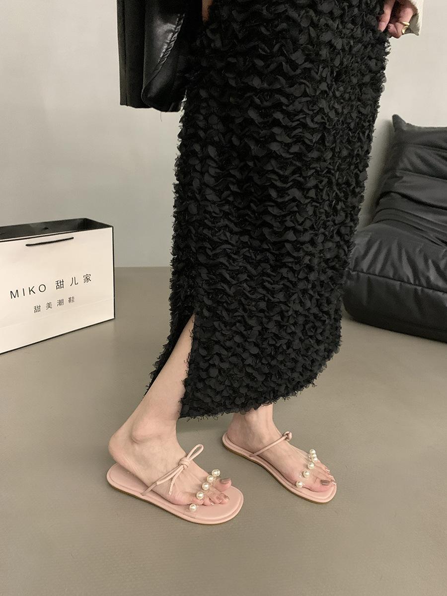 

Fairy wind flat-bottomed bow sandals women s shoes 2025 new summer outer wear holiday French beach cool slippers 39