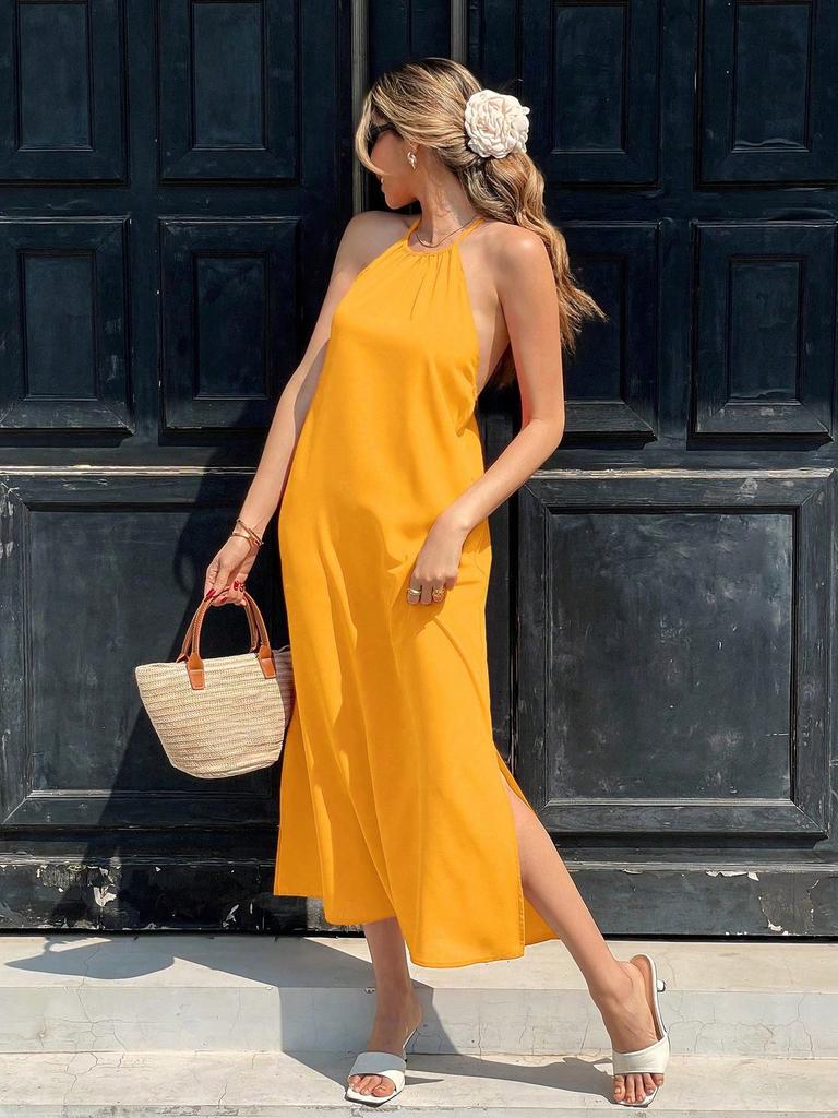 2026 new women's clothing halter neck halter lace-up dress summer seaside vacation style split-ended long dress