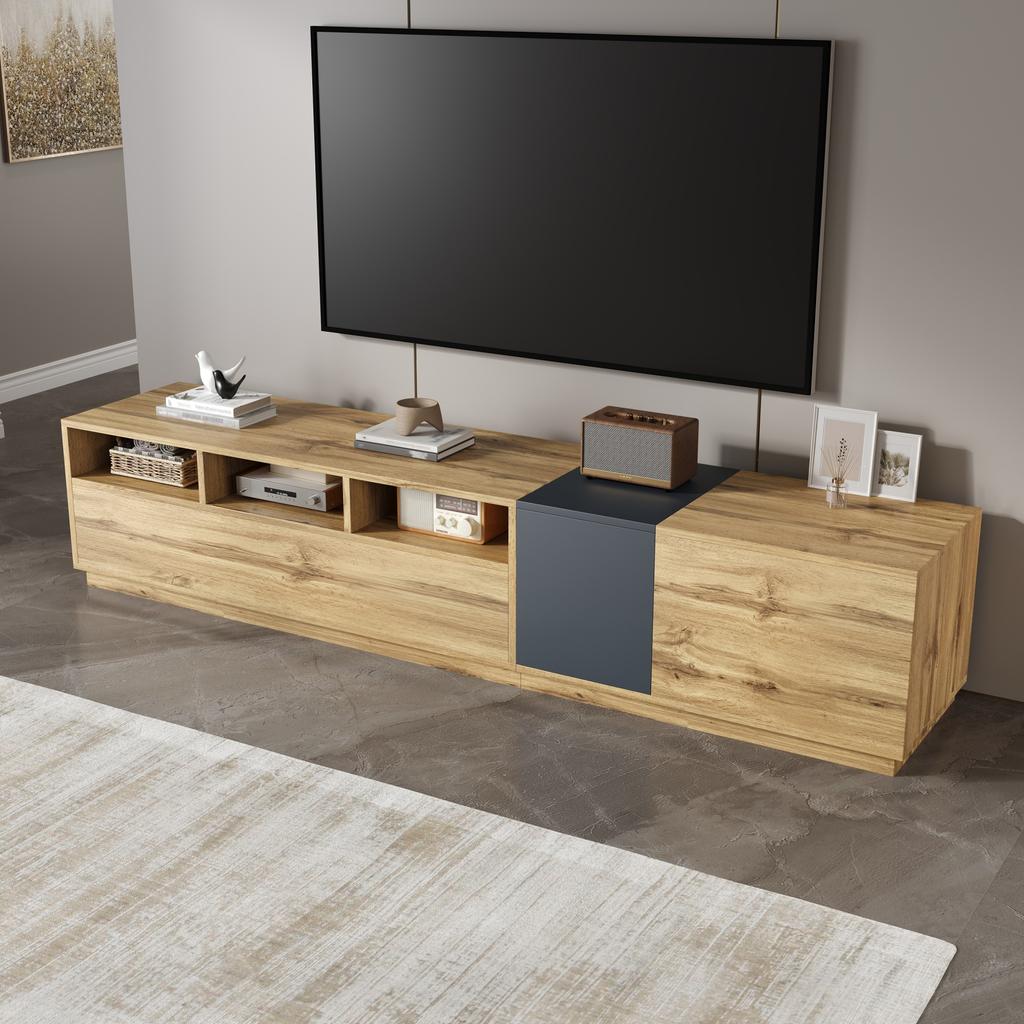 A modern TV stand in contrasting colors. With a simple, high-contrast design. With open compartments and cable openings. 200 cm