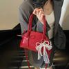 New Sweet Bow Commuter Shell Bag Women's 2025 Korean Version Simple Popular Shoulder Bag Foreign Style Armpit Bag