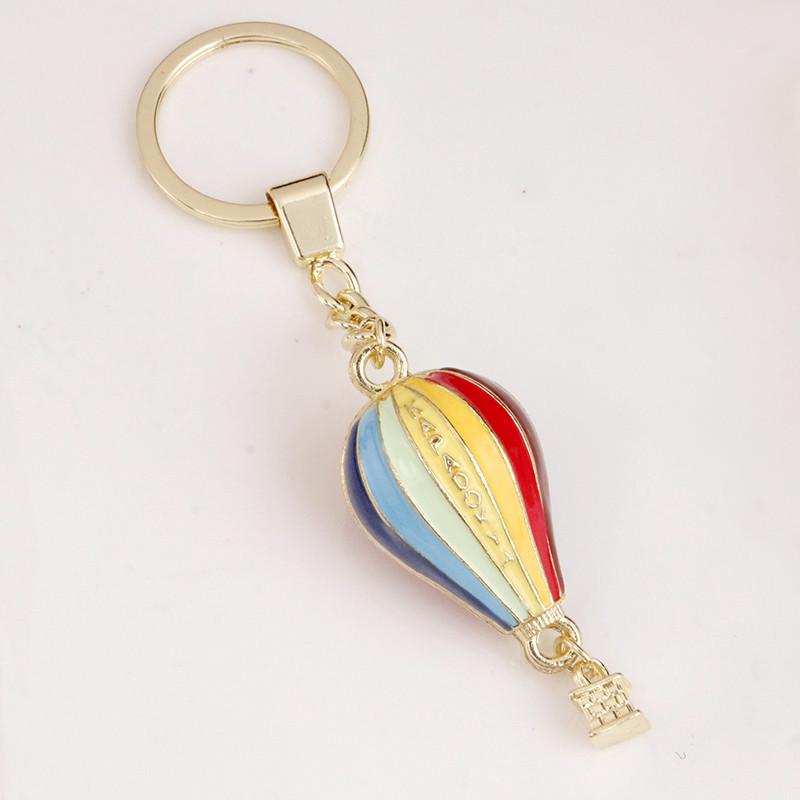 Hot Air Balloon & Hamburger Golden Keychain with Melon Seed Alloy and Sand Gold Ingot