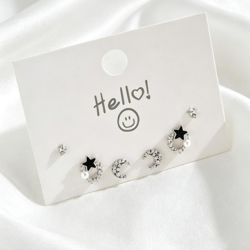 Korean version Korean creative star and moon niche women's stud earrings versatile inlaid zircon full diamond design earrings set