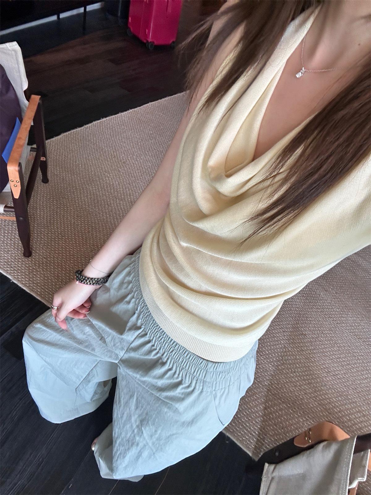 

Butterfly Treasure Xi Halter Top: A chic and stylish summer vest for women, available in 3 unique colors. Small