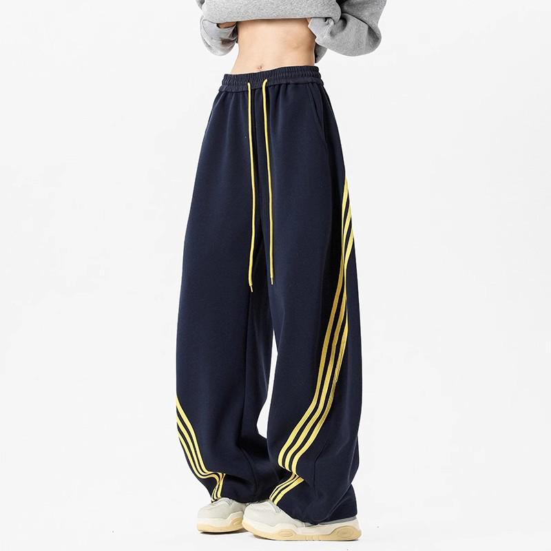 Pánské tmavě modré široké tepláky se třemi pruhy - Ležérní jarní high street trend