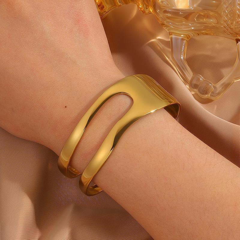 Stainless steel  women's opening C-shaped hollow irregular K gold-plated glossy  exaggerated and simple design arm ring