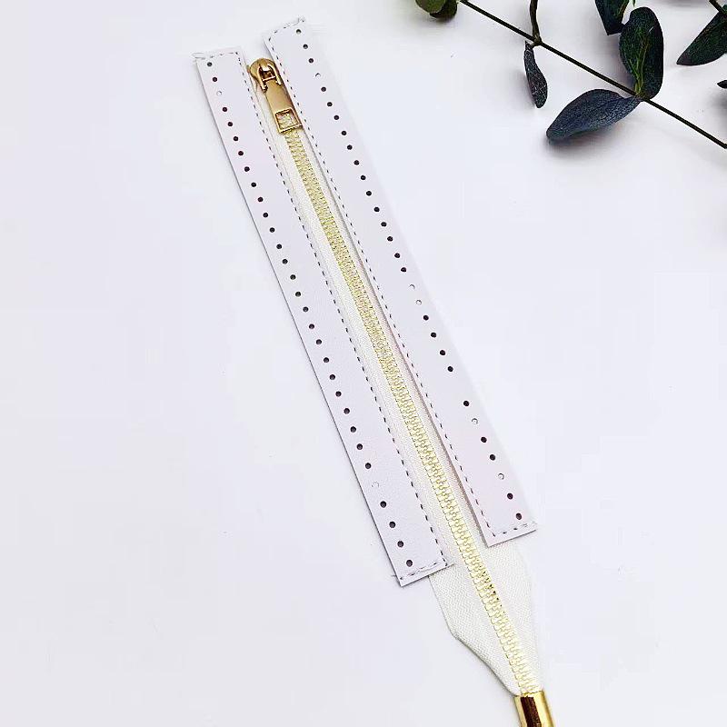 Handgjord flätad läderväska med metallblixtlås