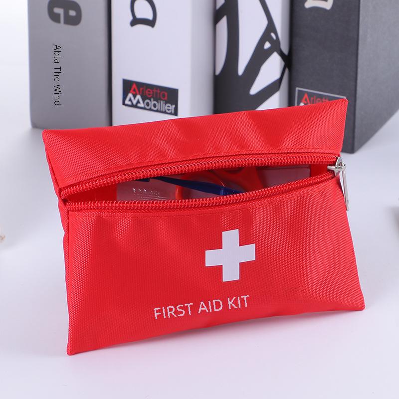 Spot Eight-Piece Mini First Aid Emergency Kit for Car & Travel (16x11cm)