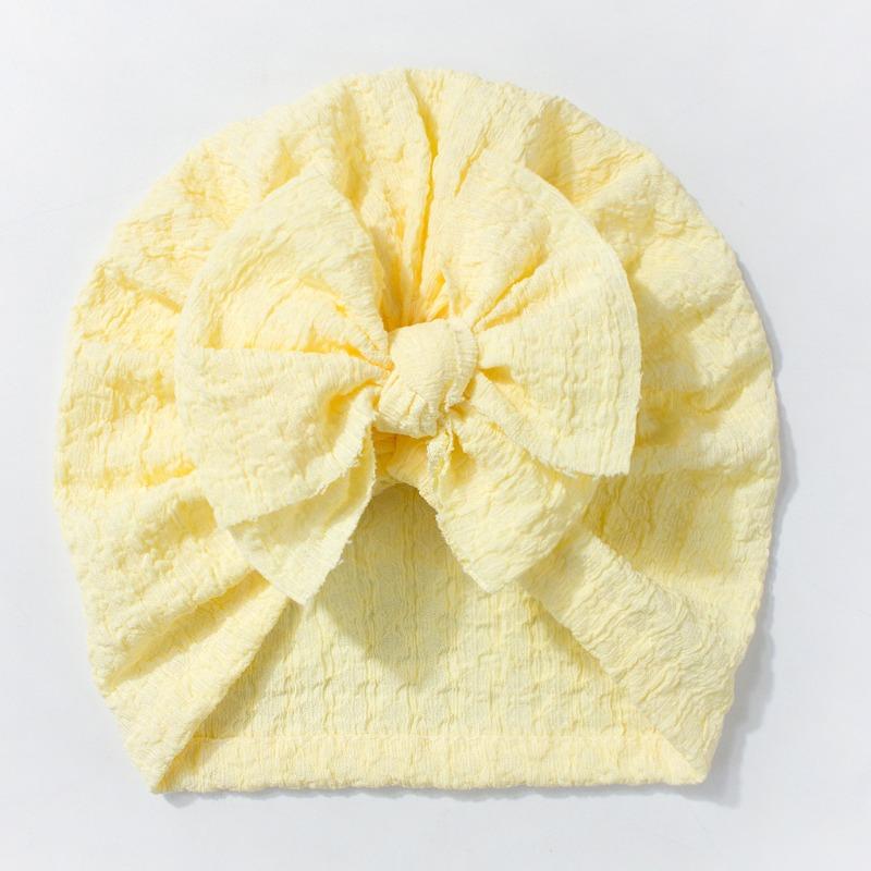 Neue Kinder-Überziehmütze, niedliche Schleifen-Babymütze, weiche und atmungsaktive Baby-Reifenmütze