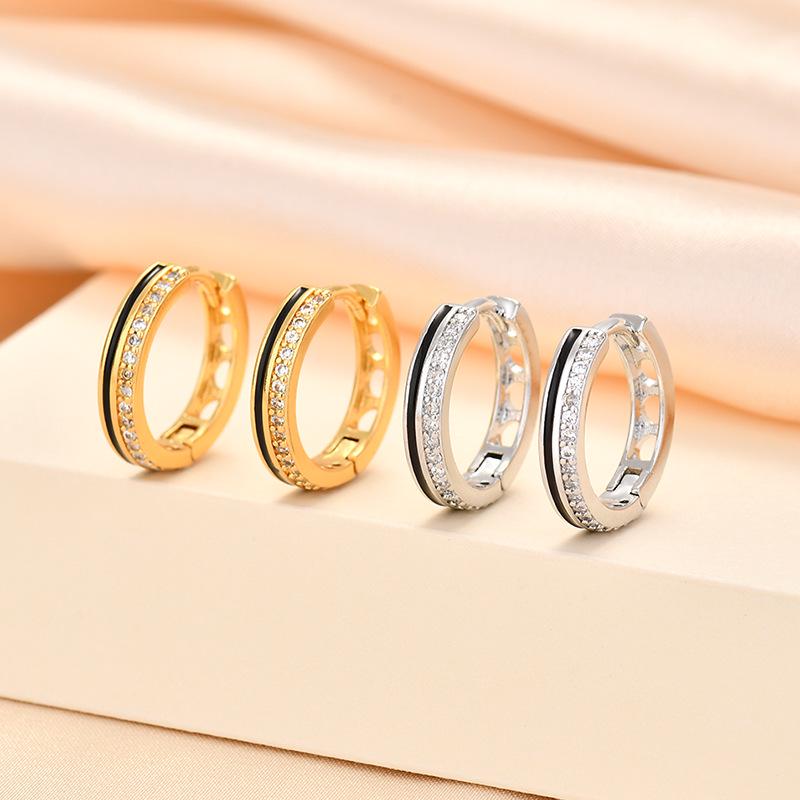 European & American Retro S925 Silver Diamond Earrings with Unique Drop Design