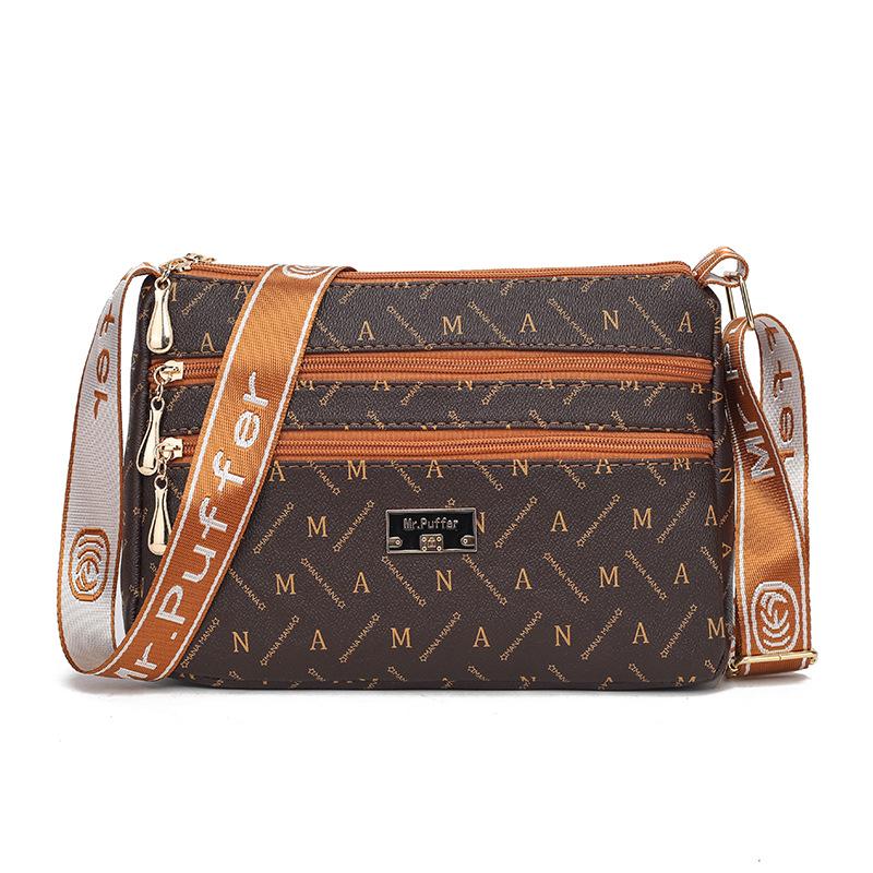 

Spring and summer one-shoulder messenger bag, high-end mother bag, going out, large-capacity mother-in-law, middle-aged woman bag Length 26.5 Width 7.5 Height 18.5