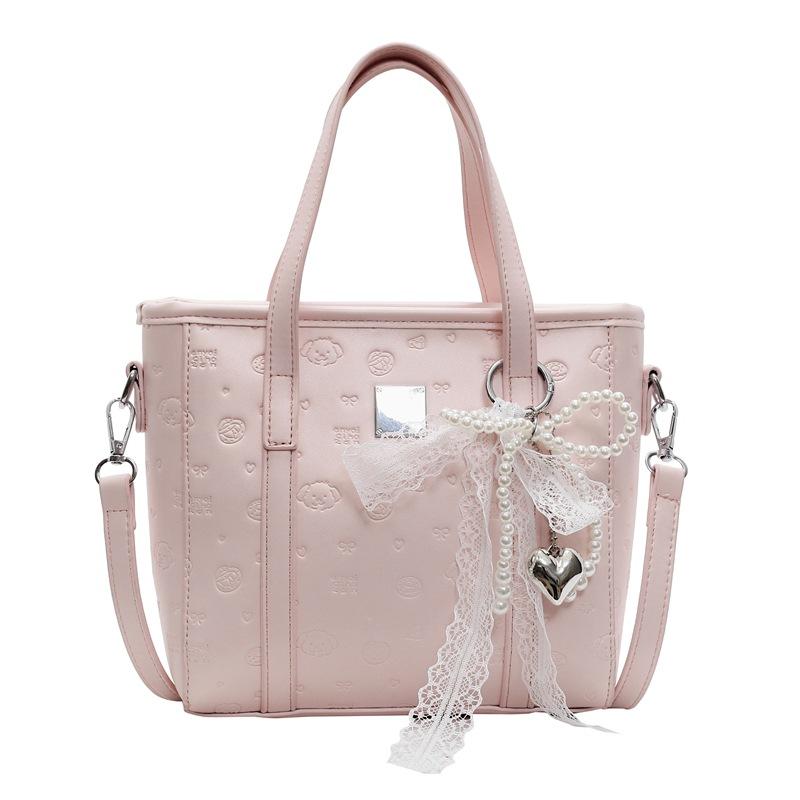 Spring and summer popular niche sweet and cute embossed portable bucket bag Korean version commuter casual versatile messenger bag bag woman