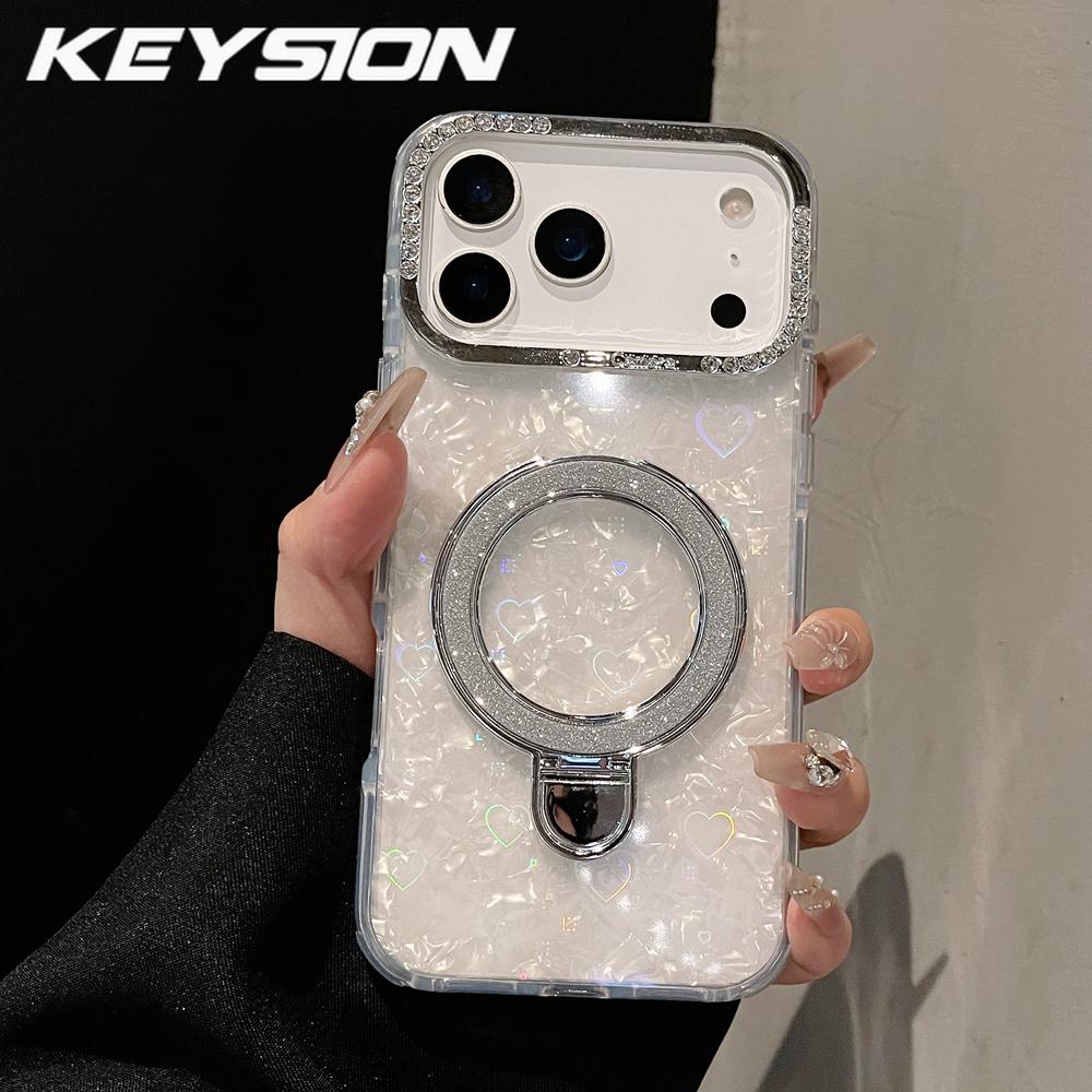 

KEYSION Магнитный чехол с текстурой ракушки, инкрустированный драгоценными камнями, для iPhone 14 15 17 Pro Max Air 16Plus, противоударный бронированный чехол-накладка с кольцом-подставкой for iPhone 17 Pro Max белый