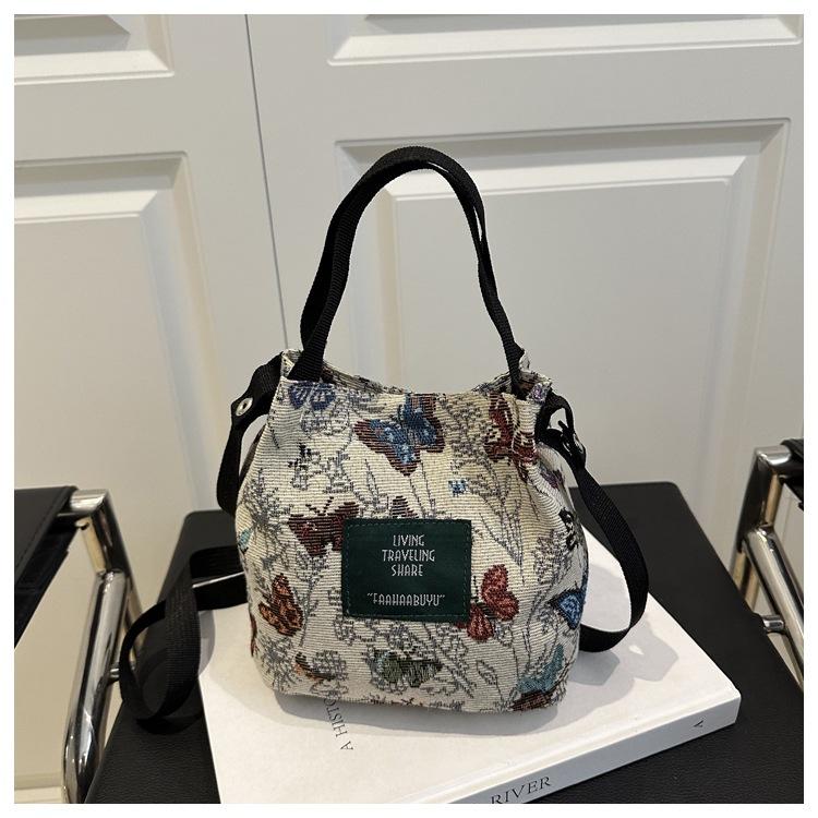 

Shoulder bag Women s fashion retro embroidery flower bucket bag Personality going out casual messenger bag