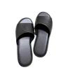 Leather niche row style one-word slippers women's outer wear summer new comfortable flat bottom soft bottom beach half tray sandals