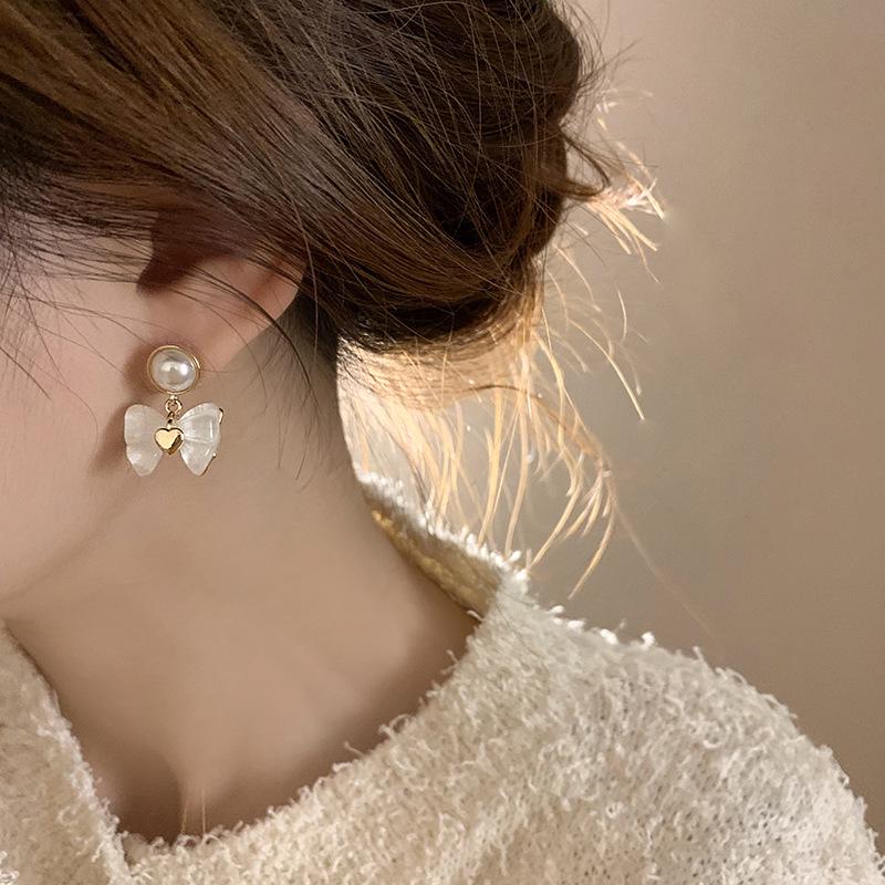 925 Silber Schleifenohrringe: Trendiger, eleganter und vielseitiger Luxusschmuck für Damen