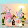 Colorful Light Up Easter Decor Featuring Adorable Doll With Bunny Ears And Eggs