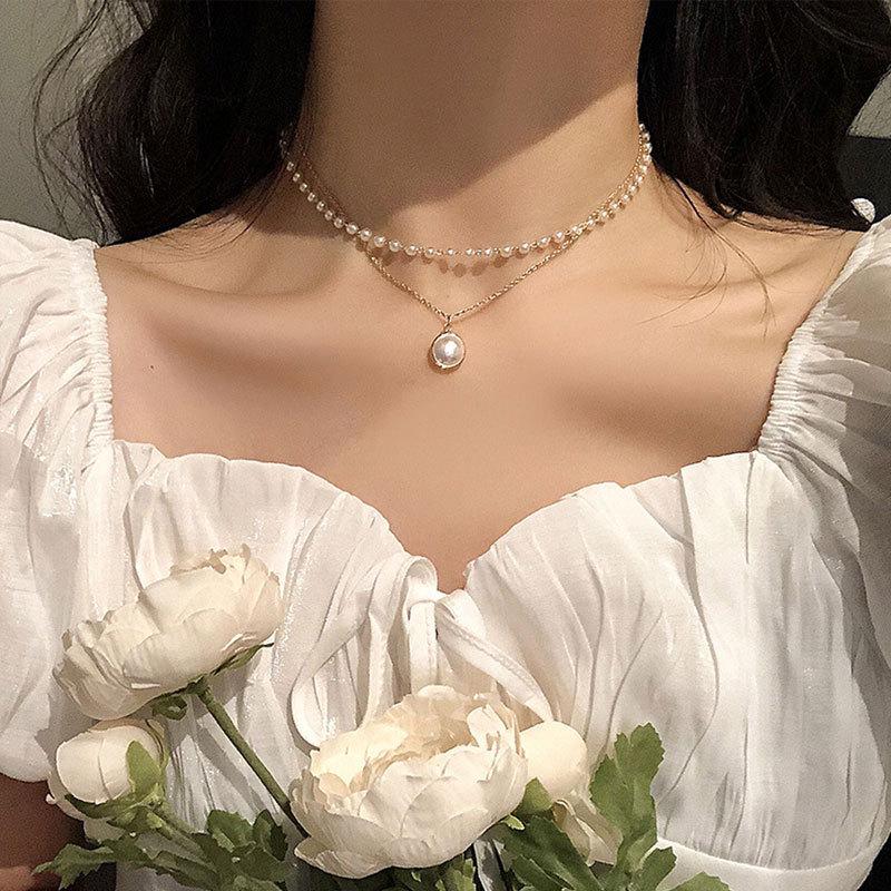 

Elegant Pearl Double-Layer Necklace with Clavicle Chain and Pendant серебряный