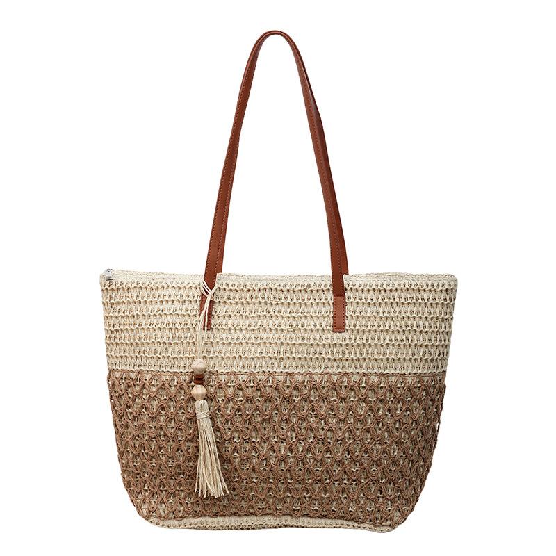 Summer new single shoulder hollow straw woven bag foreign fashion fringed woven bag vacation wind beach bag contrasting color straw bag