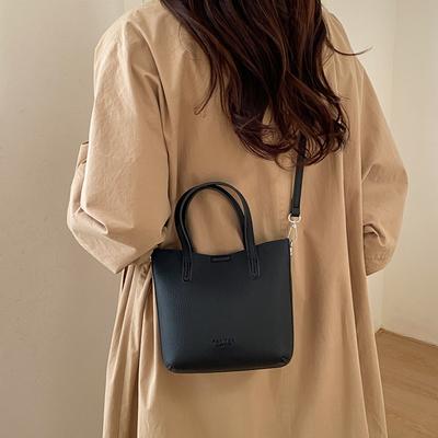 Korean Simple Niche Portable Bucket Bag Women's 2026 Spring New Fashion Commuter Shoulder Messenger Bag