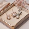 New earrings, ear hooks, short symmetrical bow pearl earrings, personalized simplicity and temperament, small earrings for women
