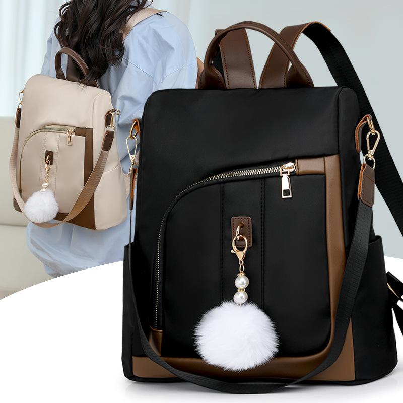 Backpack women's new simple contrasting color commuter casual backpack large capacity anti-theft women's travel bag