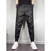 Men's Trendy Casual Elastic Slim-Fit Leather Motorcycle Harem Pants with Multi-Pockets for Fall/Winter.