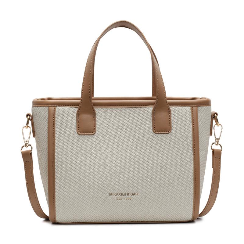 2025 spring and summer new high-end texture niche portable vegetable basket bag women's commuting versatile temperament messenger bag