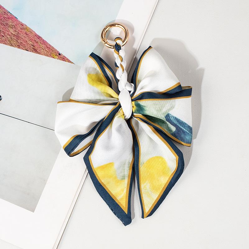 Luxury Bow Chain Bag Charm: Trendy Crossbody Strap and Elegant Pendant Accessory for Influencers