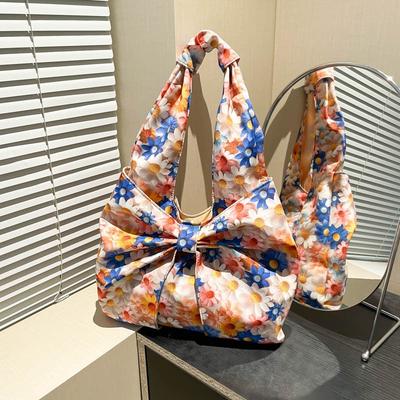 Una borsa floreale pastorale, una borsetta, una borsetta da tasca, una borsa da polso alla moda e semplice.