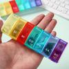 Portable 7-Grid Weekly Pill Organizer for Health Supplements and Tablets